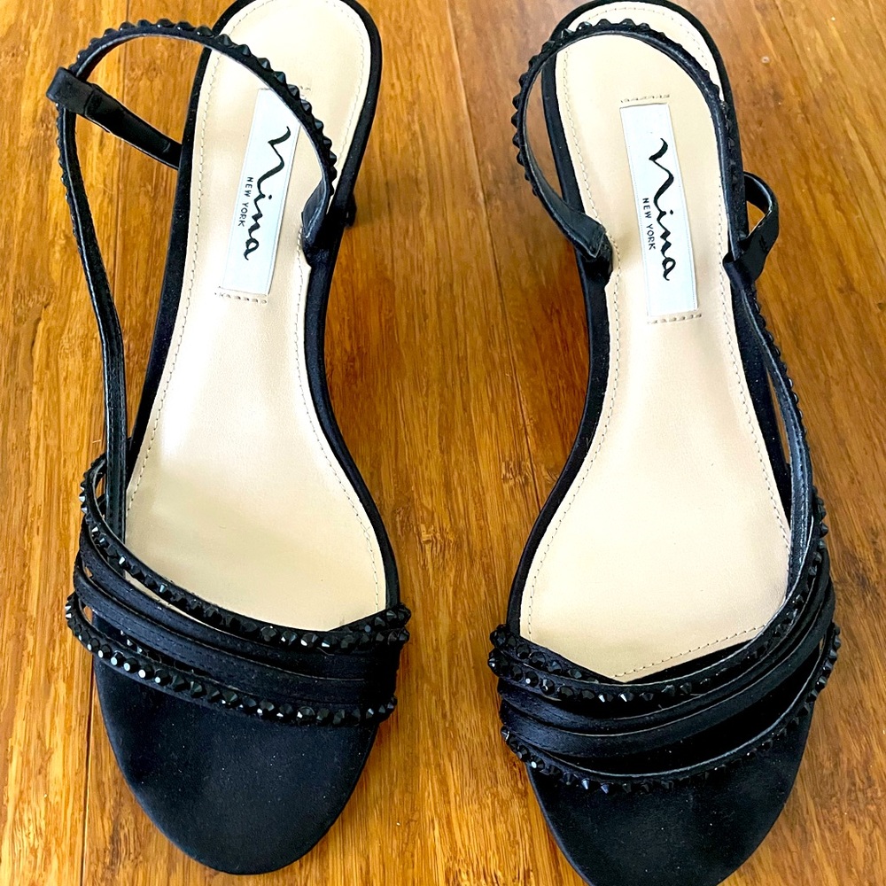 Nina black shoes gentle worn maybe once. Size 7M with blingy over to top straps